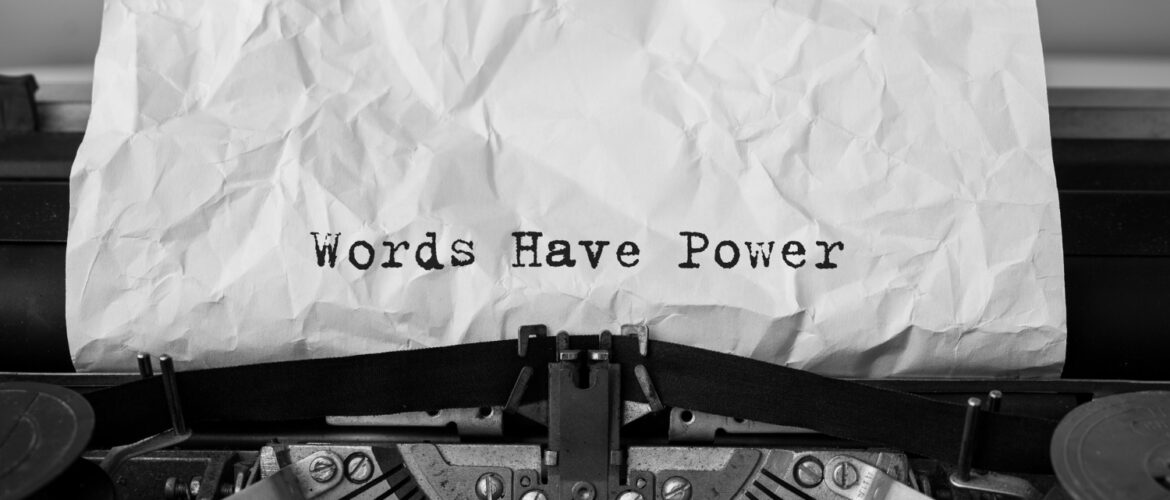 Text 'Words Have Power" typed on retro typewriter