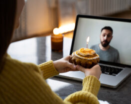 A man and a woman are talking over a video call